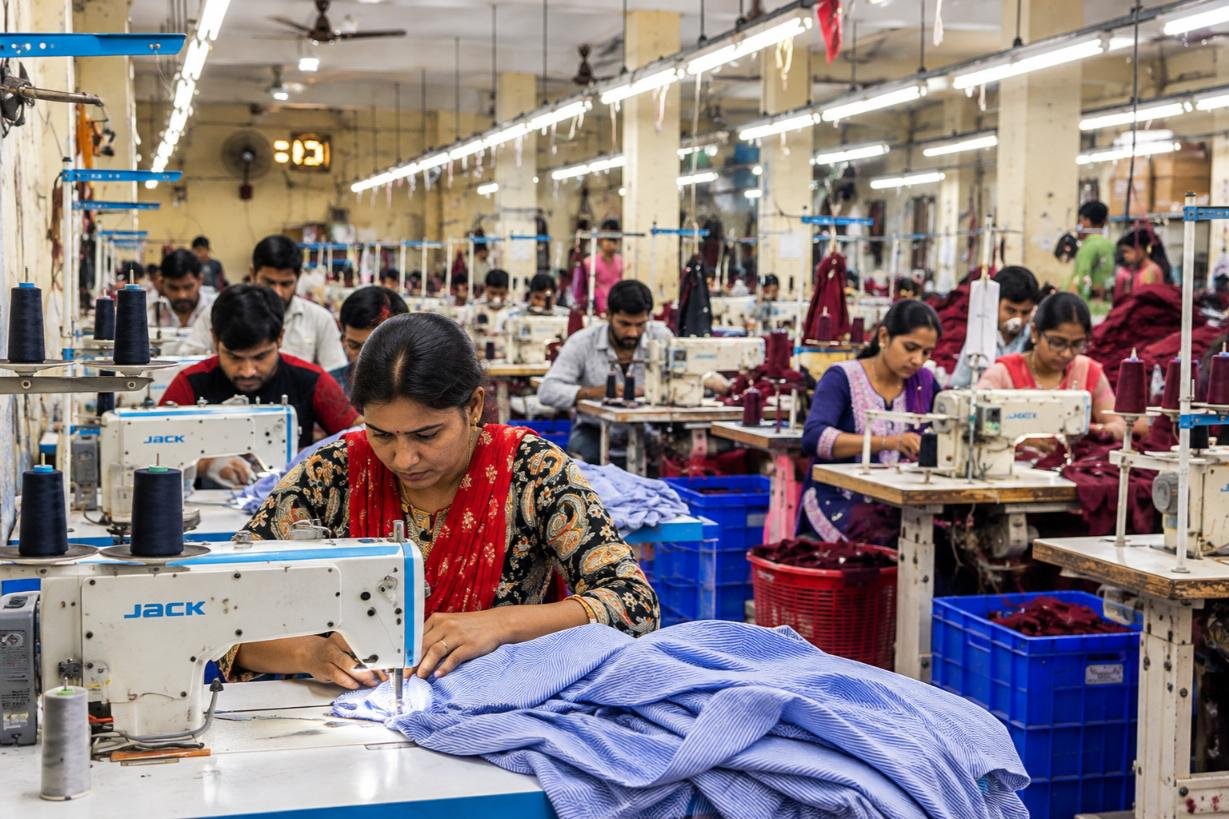 Stitching and sewing process at WOZTY's garment manufacturing facility